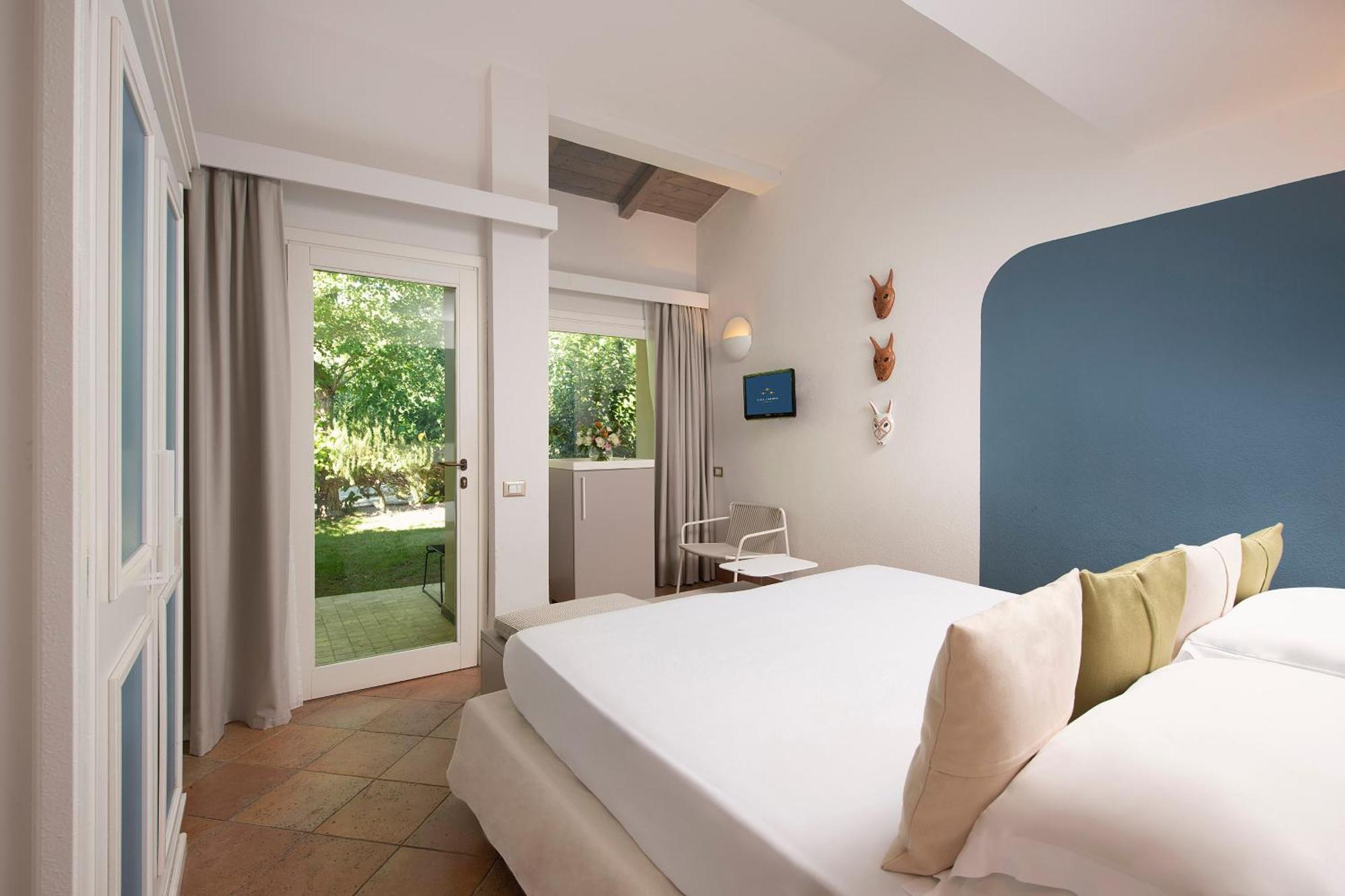 Chia Laguna - Hotel Village Room photo